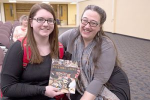 Junior MaKayla Culpitt had indigenous writer Heid E. Erdrich sign her newest published work “Original Local: Indigenous Foods, Stories and Recipes from the Upper Midwest” for her after Erdrich’s speech on Wednesday, April 6. (Photo by Taylor Nyman)