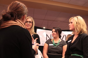 (Left to right) Jillian Benzen, Erin Cochran, and Bri Dankers pitched their agency to Mall of America clients during the event. Sarah Pickar/Winonan