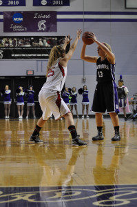 Senior guard Katie Wolff took a look at the court before making a play against Moorhead. Caitlin Reineke/Winonan