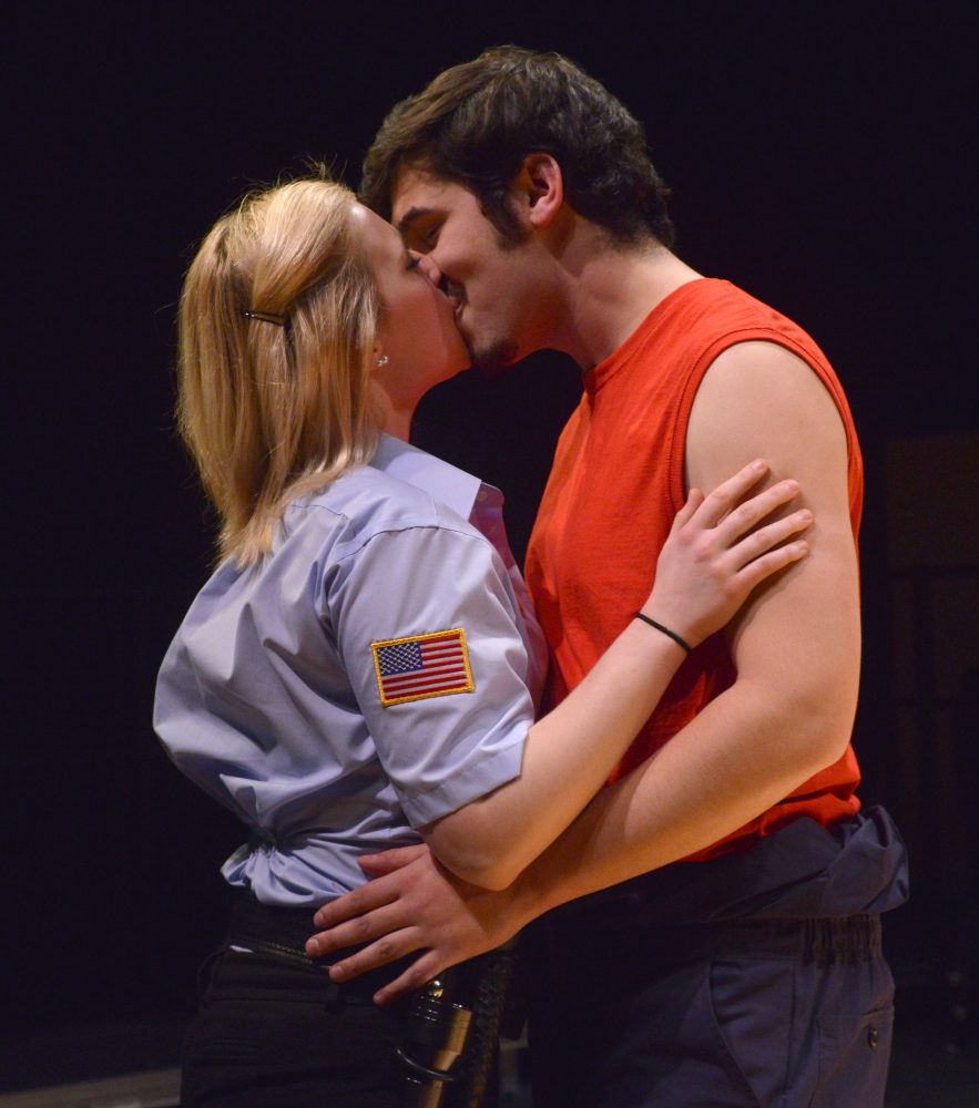 (Left to right) Bri Dankers and Andy Sroka shared a kiss during the first act of Reasons to be Pretty.
Brad Farrell/Winonan