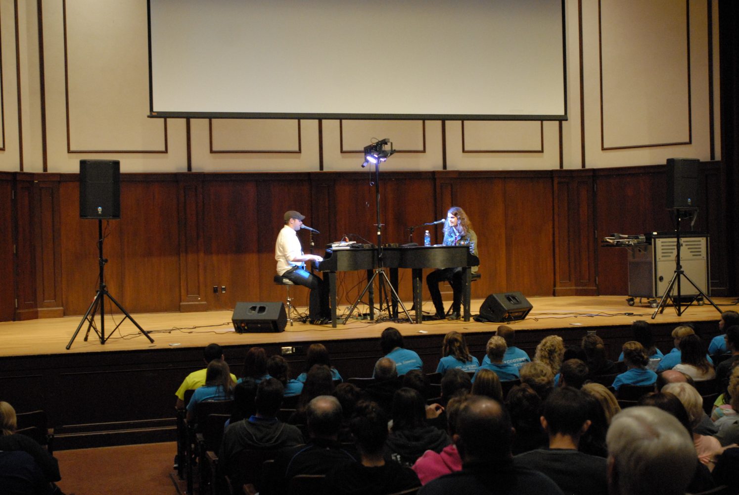 Midwest Dueling Pianos perform for students and parents in the Harriet Johnson Auditorium.
MARCIA RATLIFF