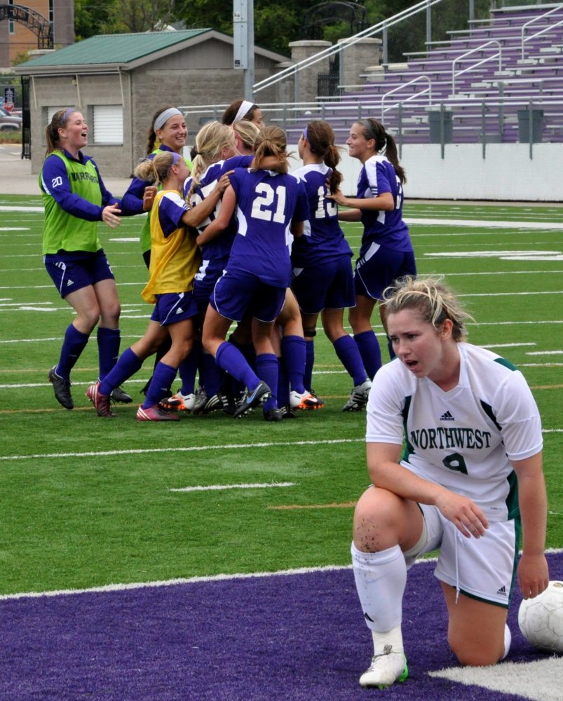 The Warriors celebrate Caitlin Lillys game-winning goal in overtime. 
BARTHOLOME RONDET