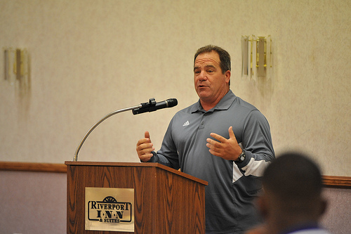 Winona State Football’s head coach, Tom Sawyer, addresses fellow coaches, players and Winona community members at Thursday’s Football Luncheon.
CAITLIN REINEKE