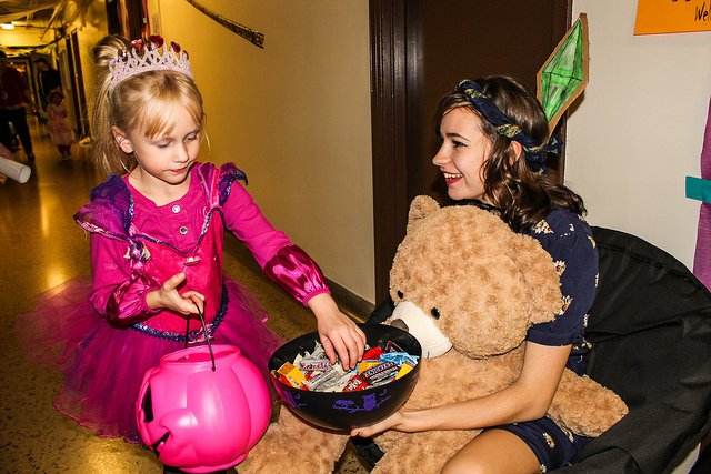 Lydia Jaworski enjoys all the cute kids in costumes trick or treating in Lourdes Hall.
TAYLOR NYMAN