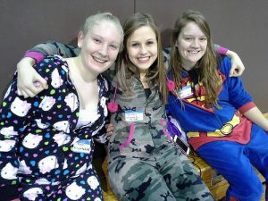 The pajama-ed trio, Team All Night for the Fight: Megan Tuohy, Brittany Ellingson and Alyssa Meyer. HANNAH JONES