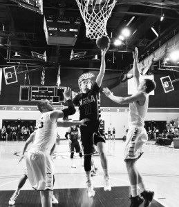 Riley Bambenek goes in for a shot against Augustana. BARTHOLOME RONDET