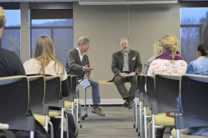  Kim Chapman (left) and Jim Armstrong (right) read from their book, “Nature, Culture, and Two Friends Talking,” on Wednesday, Oct. 28 in Haake Hall. (Photo by Brianna Murphy)