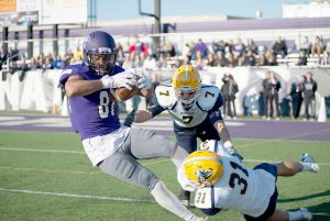 Senior wide receiver Josh Mikes receives a pass for a large gain on Saturday against Augustana at Altra Federal Credit Union Stadium. The Warriors lost the home game against Augustana 35-34. (Photo by Jacob Striker)