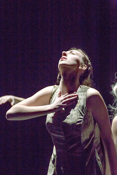 First-year Hannah Pulver-Knowles struggles for a breath as she performs in the dance “From Within,” which represents a heart striving for a second chance in life.