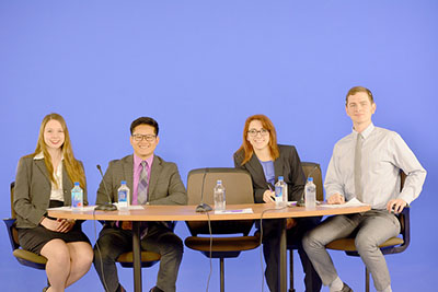 Left to right: Michaela Curley, Duc Nguyen, Danielle Weiler and Benedict Linsenmeyer participate in the Warrior Debate about social media and Winona State University’s responsibility to provide a set of guidelines. (Photo by Emma Masiulewicz)