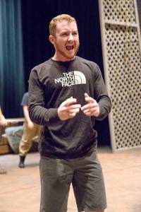 Senior Derek Wagner rehearses his monologue as Oliver from Shakespeare’s “As You Like It,” opening Wednesday, April 13 on the PAC main stage. (Photo by Taylor Nyman)