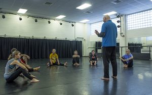 Guest choreographer Daniel Stark shares tips and tricks on how to perfect on stage movements during a dance seminar in Memorial 300 on Thursday evening. (Photo by Zach Bailey)