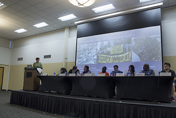 A student and faculty panel gathered Monday night in East Hall to encourage the listening and learning of students’ experiences on campus to promote a better community. (Photo by Michaela Gaffke)
