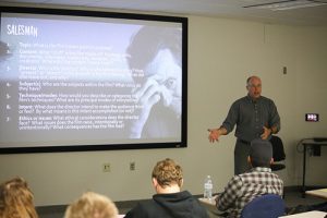 Film students learn about the different cultures and time periods of how films were portrayed and organized throughout history from professor Paul Johnson on Monday, Oct. 10. (Photo by Kendahl Schlueter)