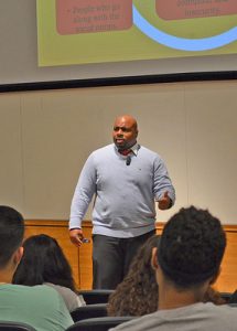 Critical race theorist Marcellus Davis discusses race and inequality in his talk “Everybody Wanna be a Nigga, but Nobody Wants to be a Nigger” on Monday, Oct. 17. (Photo by Nicole Girgen)