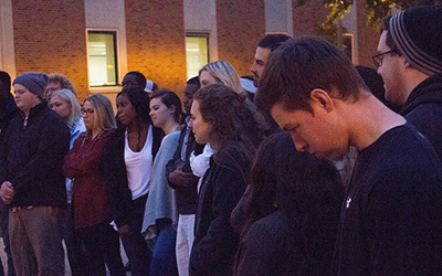 Students gather to remember Winona State sophomore Chukwudi Benjamin Onyeaghala, 19, whose body was found in the Mississippi River near Homer, Minn. on Tuesday, Oct. 18. (Photo by Nathaniel Nelson)