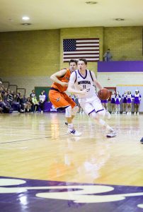 Men’s basketball wins opening home game