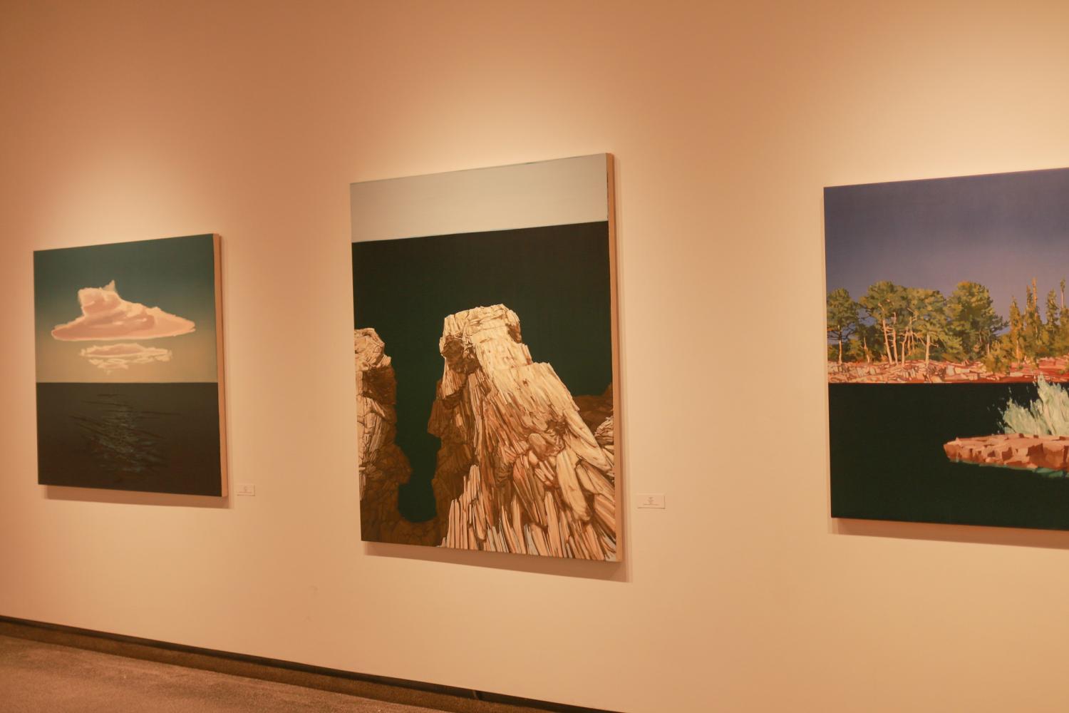 Three of Carey’s paintings show Carey’s vantage point on Rabbit Island in Lake Superior during his most recent artist residency. Carey has been selected to do artist residencies in several locations around the world, including the Arctic Circle.