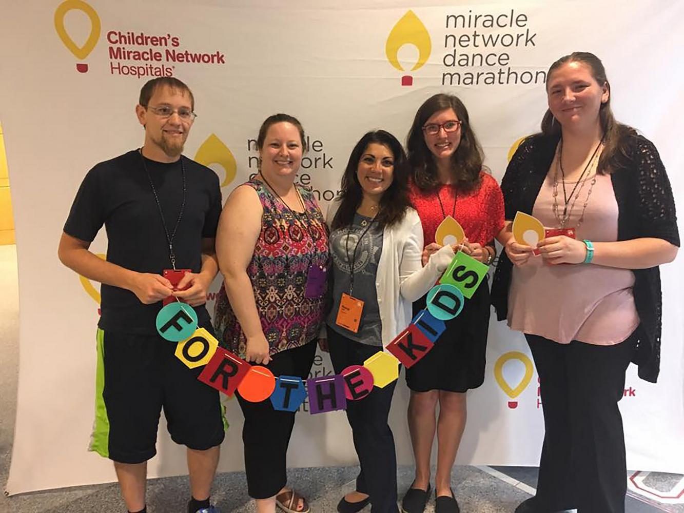 Members of Warriors for the Kids stand at the Dance Marathon Leadership Conference at Ohio State. The Marathon, an annual event starting in 1991, first began at Indiana University in memory of a student who passed away from HIV/AIDS.