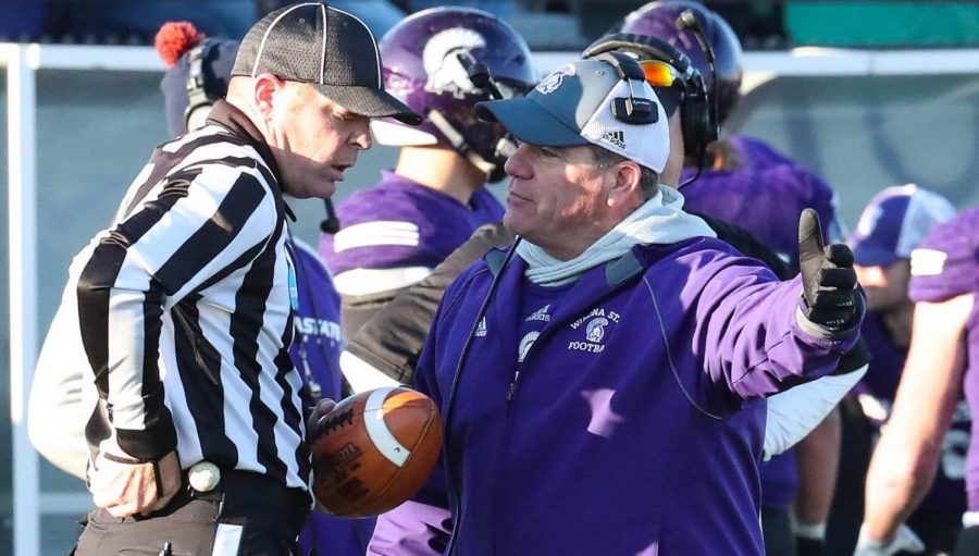 Winona State head football coach Tom Sawyer speaks with an referee at the NCAA Playoffs against Texas A&M-Commerce on Saturday, Nov. 18 at Altra Federal Credit Union Stadium. The Warriors lost 6-20, wrapping up their season with an overall record of 10-2. Sawyer was named the NSIC Coach of the Year.  