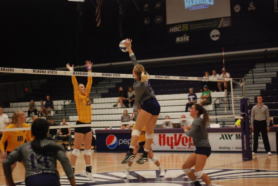 First-year Madison Rizner spikes the ball against Minnesota State University Mankato on Thursday, Sept. 6 in McCowan Gymnasium, the Warriors lost to the Mavericks 2-3. 