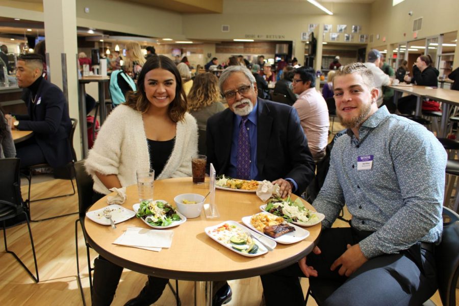 The Minnesota State Chancellor Devinder Malhotra eats with seniors Christina Melecio and Reid Peters on October 16 in the Jack Kane Dinning Hall. The annual Board of Trustees for Minnesota State meeting was hosted at Winona State this year where one of the topics discussed was the Re-imagination Minnesota project. 