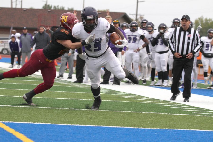 Senior running back Eric Birth runs towards the end zone to take the lead in the fourth quarter against Northern State University where the Warriors won 22-15 on Saturday, Sept. 29. 