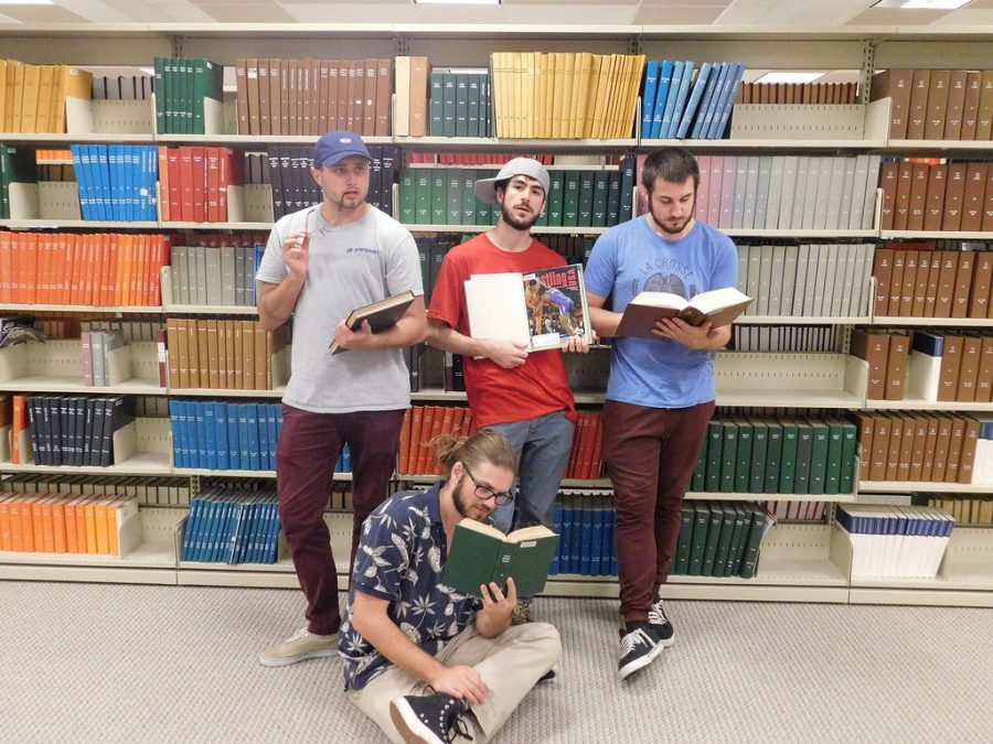 The members of Karate Chop Silence studying hard in the library. The boys have been a band for just over two years, playing shows all across the midwest, and are especially popular in Iowa, according to guitarist and lead vocals Mason Smith.
