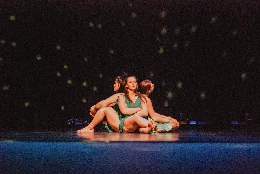 Left to right: Seniors Jenna Grochow, Hannah Ose and junior Tatum Reitter sit at the beginning of ενοχλεί, meaning It Bothers You when translated from Greek. It was choreographed by sophomore Nicolle Bond and performed on the Vivian R. Fusillo Main Stage. 
It was one of twelve performances throughout the production, which lasted about two hours. 
There were about 31 performers in total that were involved in the 2019 Dancescape production. Directed by Eric Drummond, Dancescape is a creative and contemporary production that allows dancers and choreographers freedom to be as innovative as they wish with their performances.