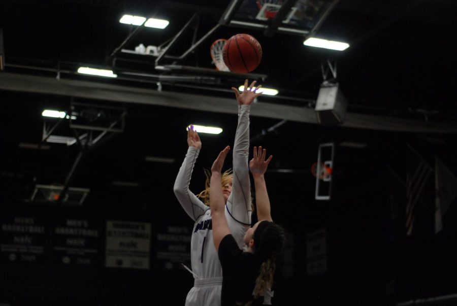 Junior Gabie Doud attempts to score against Minot State University during the first round of the NSIC Tournament on Wednesday, Feb. 27 in the McCown Gymnasium. The Warriors won against the Beavers, moving on to the next round where they ended the season with a loss against Minnesota State University Moorhead.