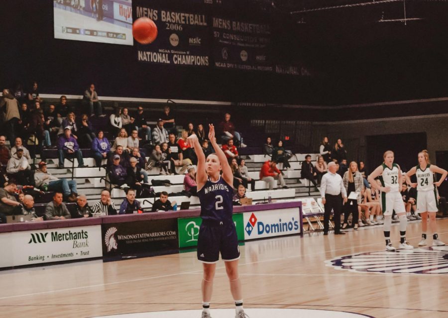 Winona State sophomore, Allie Pickrain makes a single shot at the home game on Saturday, Nov. 16 against Bemidji State. The Warriors emerged victorious scoring 76-67. 