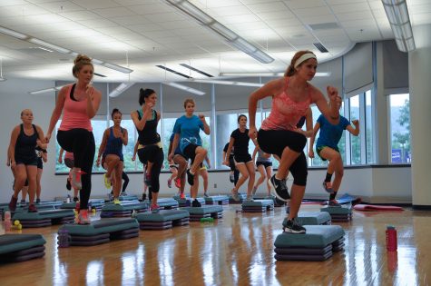 Fitness Instructor Hanna Barritt leads her Butt N Gutt class before COVID-19 caused restrictions on Winona States campus. Intramural and sports clubs must now adapt to new regulations in order to keep students, faculty and staff members safe. 