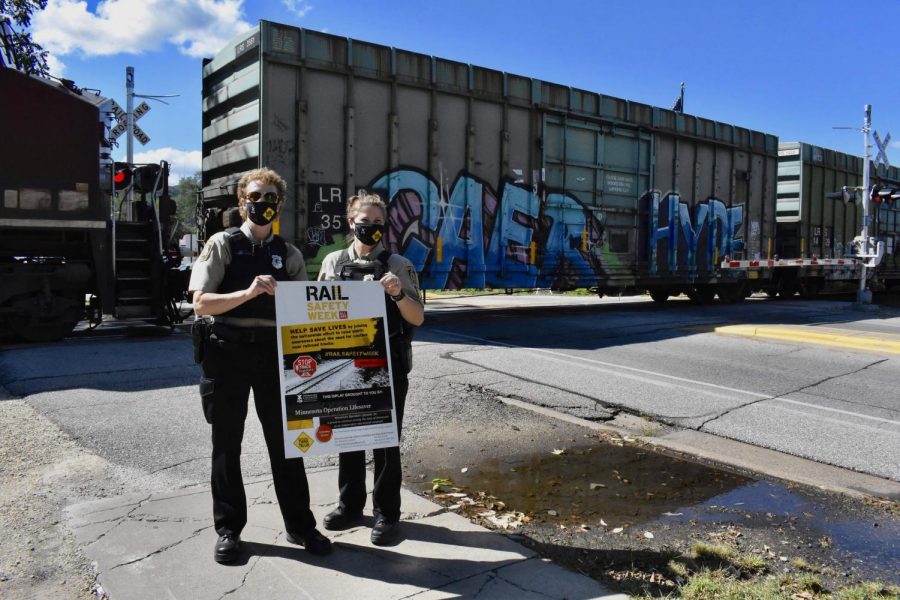 Canadian Pacific Railway (CPR) Special Officer Tracy Bergerson (left) and CPR Special Officer Michele Mair (right) at the Huff St. railroad crossing at 12:15 p.m. on Sept. 22, 2021 in celebration of Rail Safety Week 2021. Both Bergerson and Mair have worked with Rail Safety Week for years, Winona being one of their favorite stops, they said. It is Winona State University’s fifth year participating in the event.