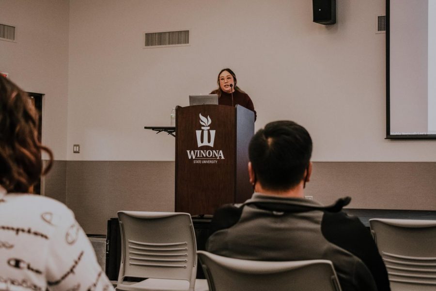 Jouapag Lee, the guest speaker of Oct. 13s Expanding Perspectives series second event, pictured presenting in the Kryzsko Ballroom. Lee spoke about the encounter at Winona State that sparked her involvement in social justice, among other topics.