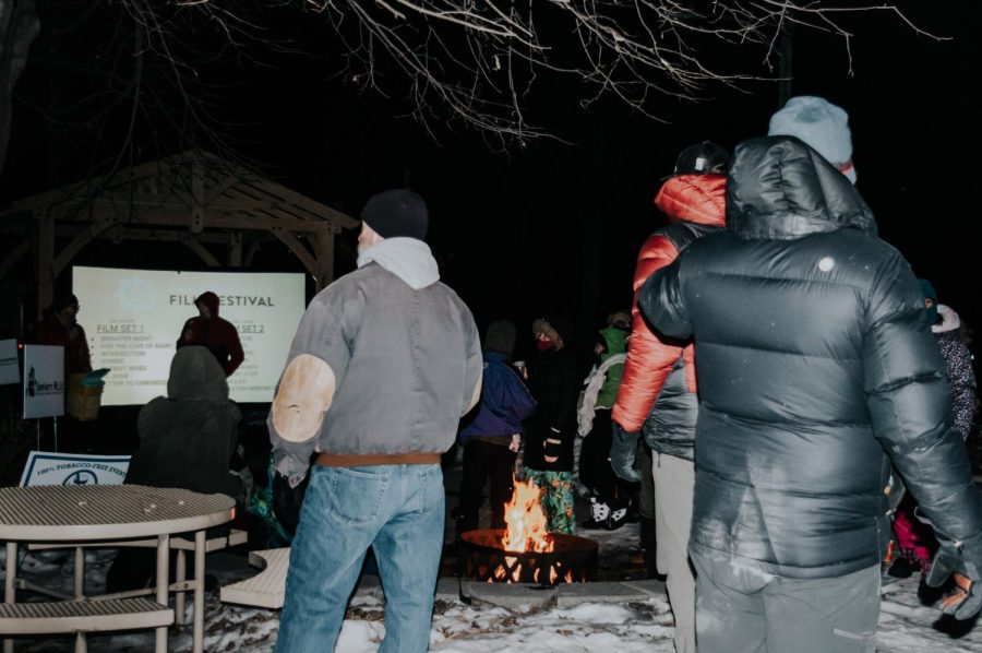 Two film showings were held after the snowshoein event when the sun had set. Several bonfires were l near the viewing area for people to gather around. Everyone was welcome to join the showings for fre as part of the 17th Frozen River Film Festival.