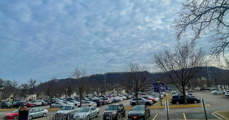 Winona State Universitys Integrated Wellness Complexs park- ing lot will soon have a roof of solar panels thanks to a landmark sustainability project: the LESS Plan. The project will cut Winona States carbon emissions by nearly 1/4.