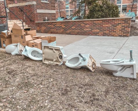 While renovations were being made in residence hall bath- rooms, torn-out toilets sat out- side for awhile.