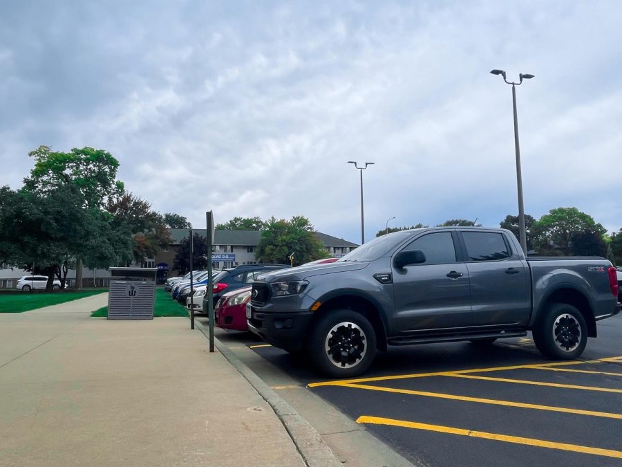 Students have been struggling to find parking spots for their vehicles, particularly in Silver Lots, despite purchasing a parking pass. While a new gravel lot is now available on Belleview street, cars still line the streets near campus.