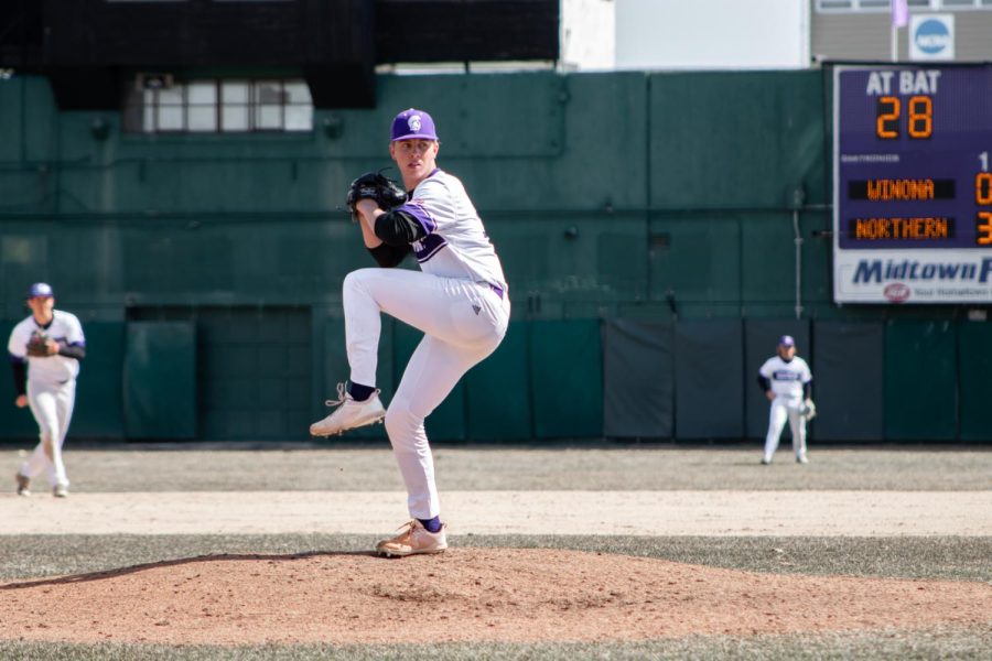 Pierce Gritzmaker pitching for the Winona State Baseball team.