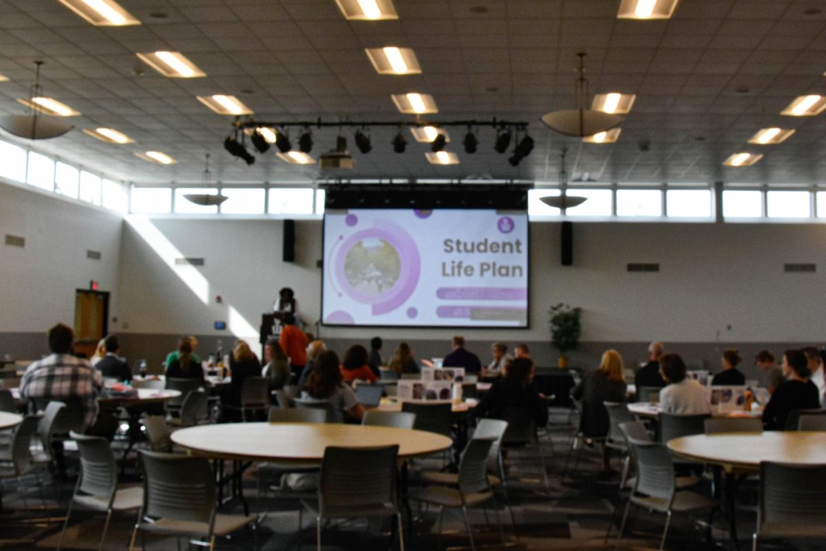 Students and staff gather for a presentation about a student life plan during University Improvement Day. Here they discussed how they can be a well-rounded and well-developed student.