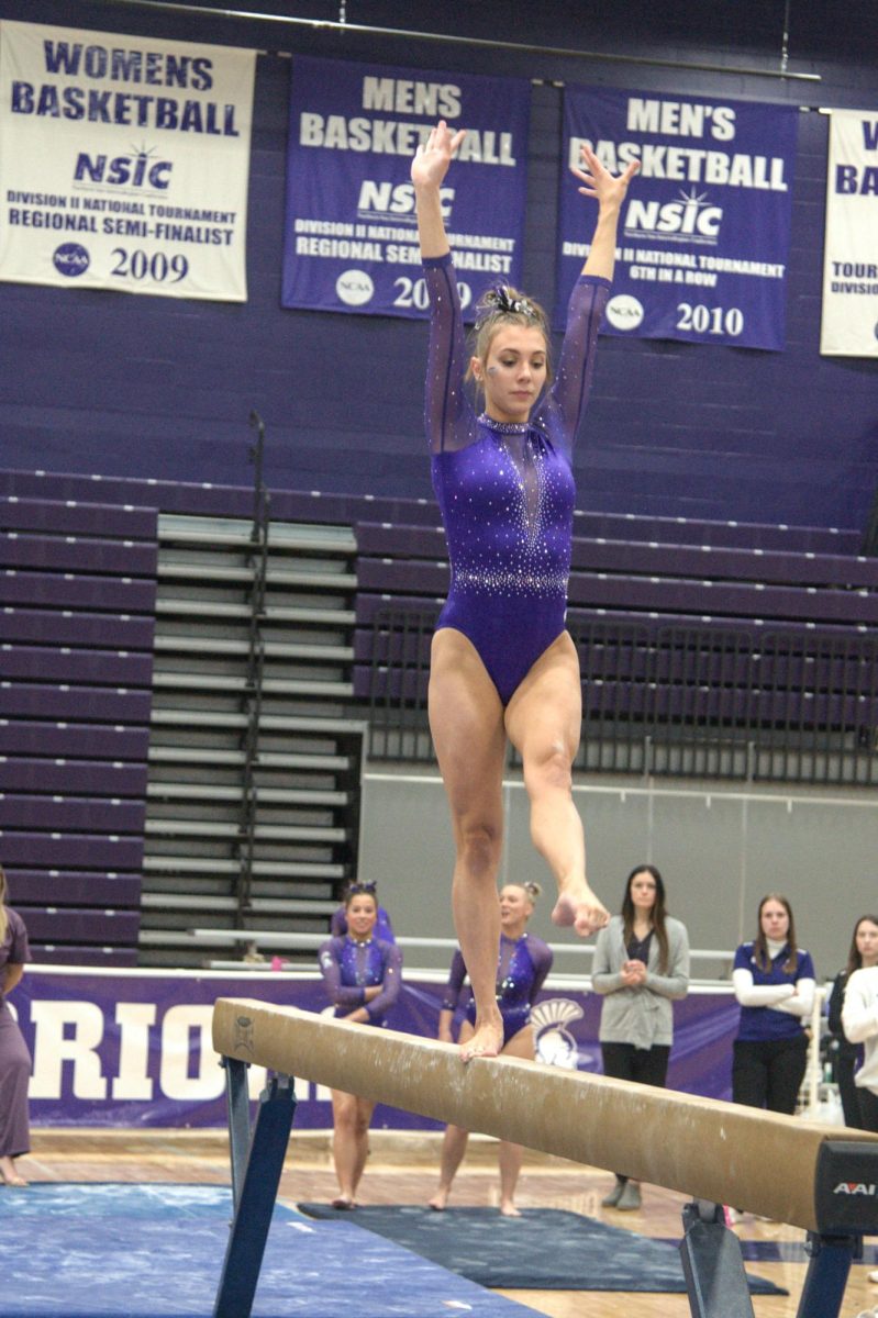 Taryn Sellner, 4th year student at Winona State from Mankato. She is performing on the “Beam”.  