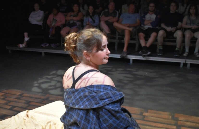 Sanorah Goldoff, an actress and the producer of this production of "Alabaster," poses as her character, June, during a live performance. Photo Contributed by the WSU Theater Department.