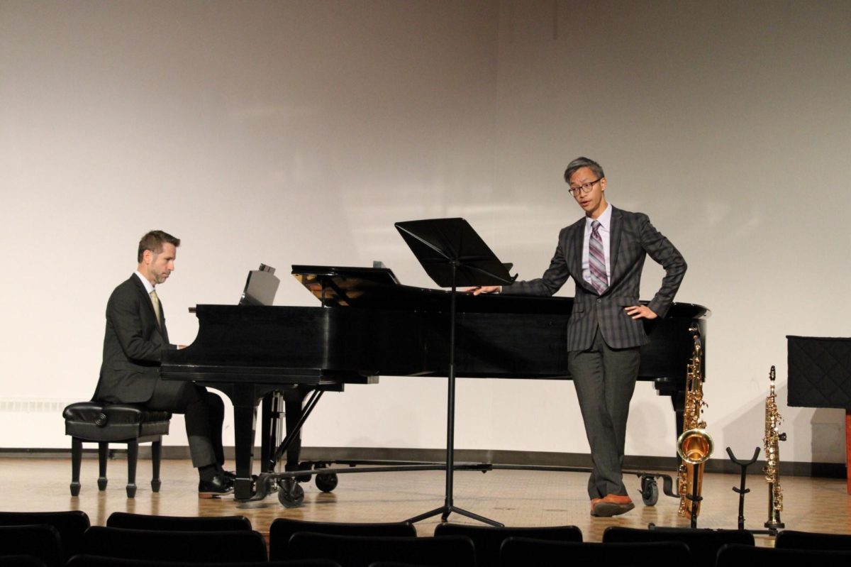 Justin Dadgerow on the piano and Jerry Hui singing Baritone as they perform at the Gershwin Celebration.