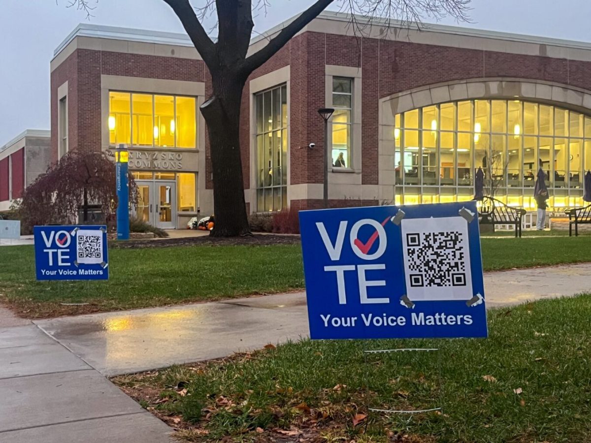 Signs scattered across campus encourage students to vote right in Kryzsko Commons.