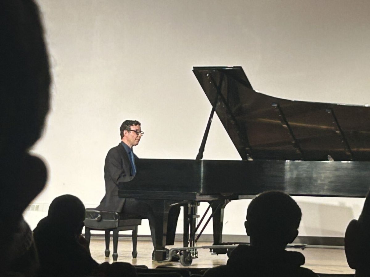 Eric Brisson wowed the crowd at the faculty recital, sharing his passion for music with the attending guests through song. 