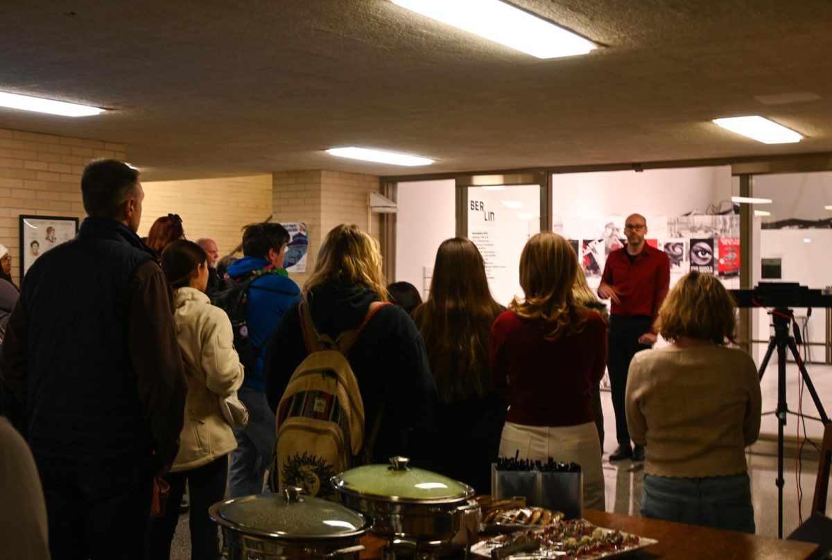 WSU students and faculty admiring the “Berlin: Shifting the Paradigm” art exhibition. 