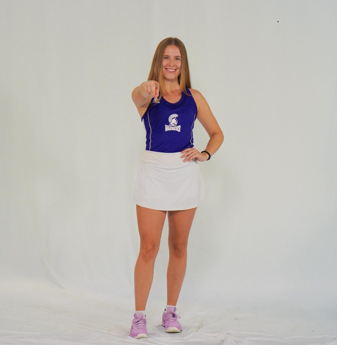 A smiling Clara Thoemke from 2025 Media Day for the Warrior Women’s Tennis. 